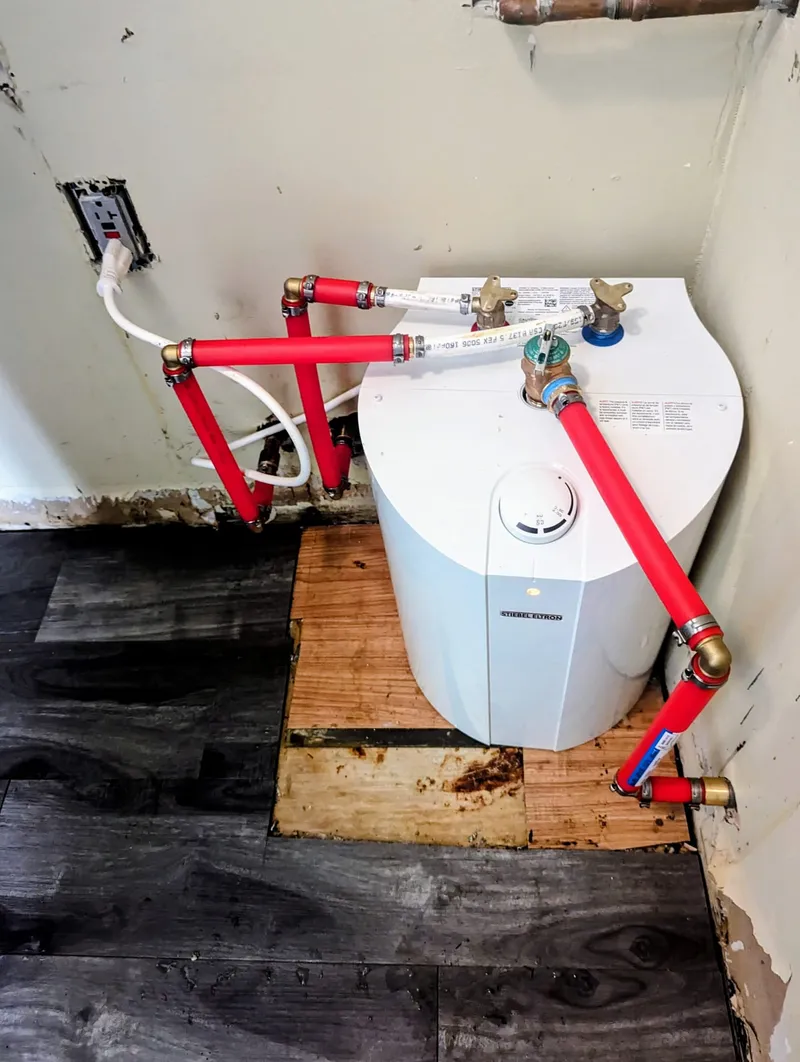 Point-of-use water heater installation in a Pleasant Valley home