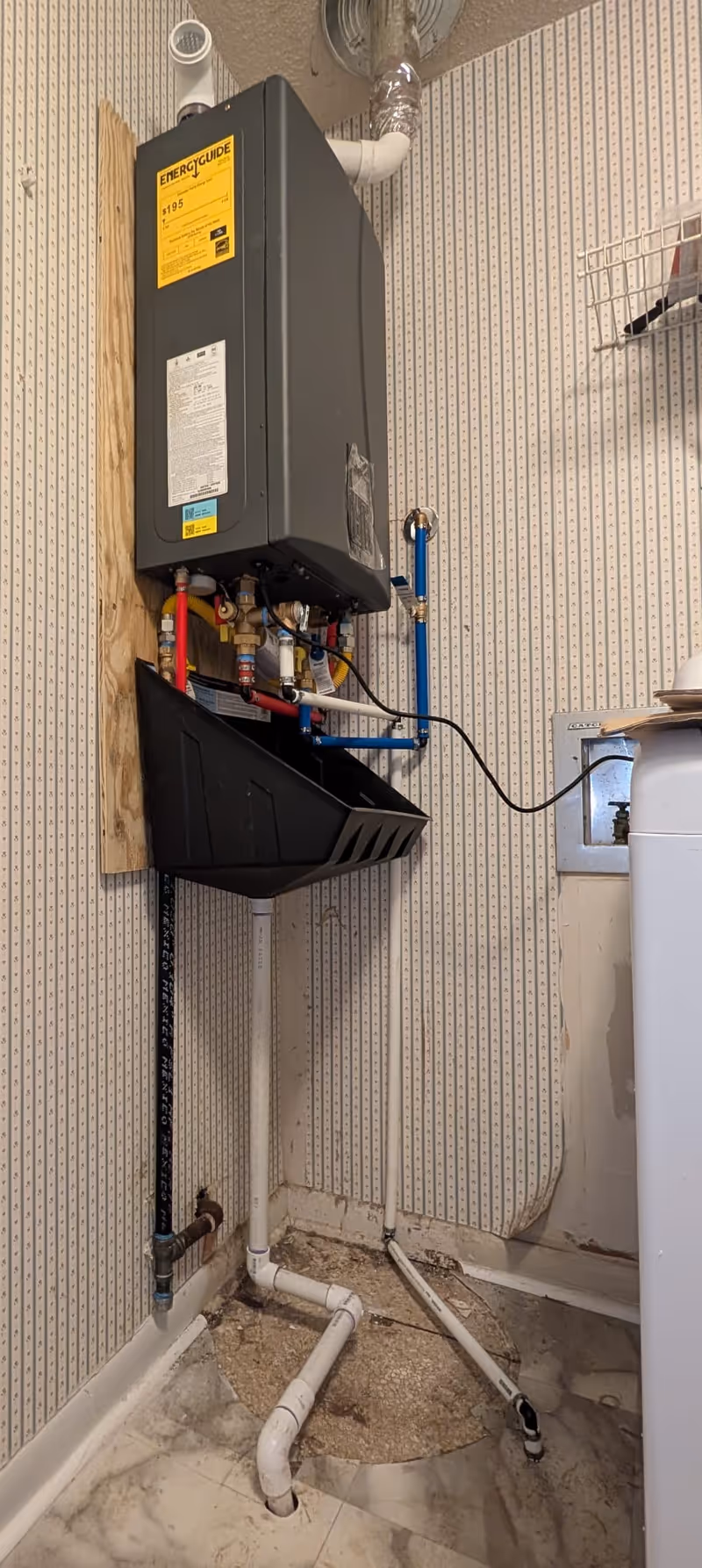 Tankless water heater installation in a Kanis Road home