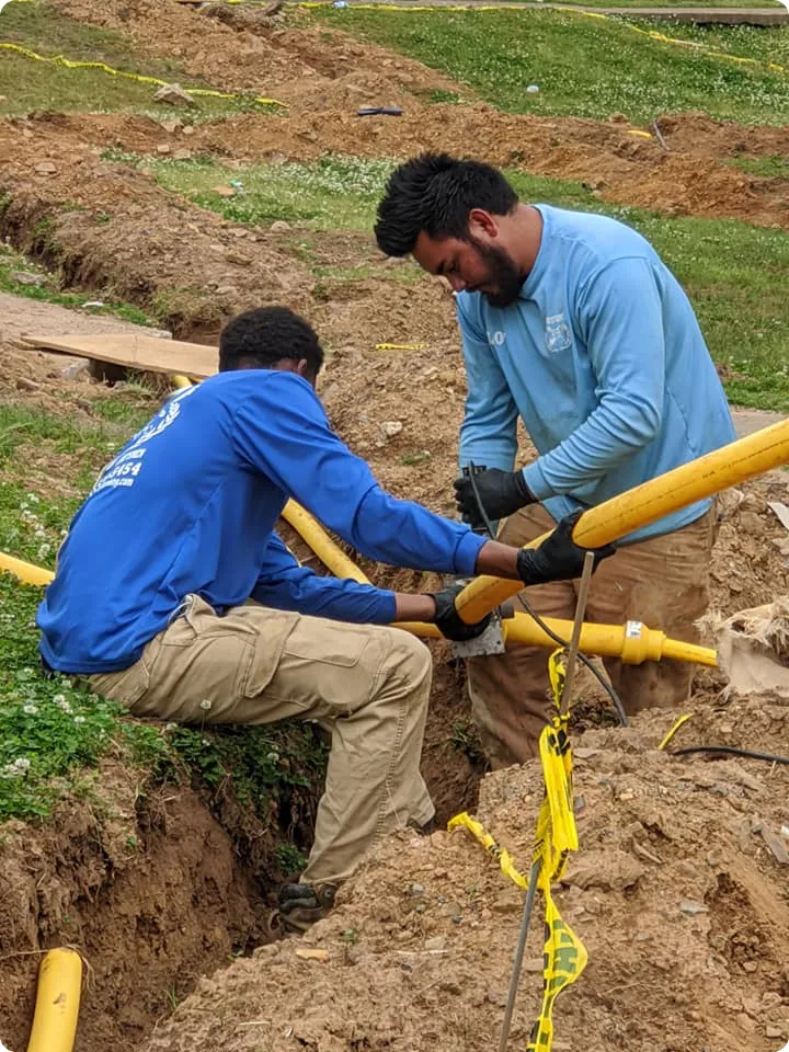 Diamond State Plumbing crew installing underground gas lines